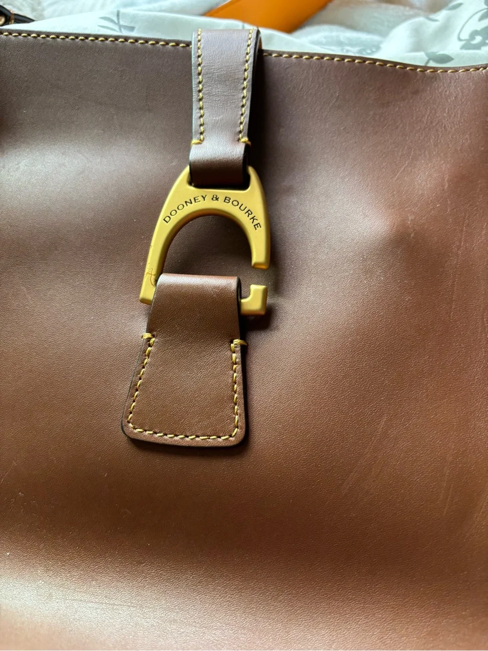 Dooney & Bourke Brown Leather Messenger with Gold Hardware Accent